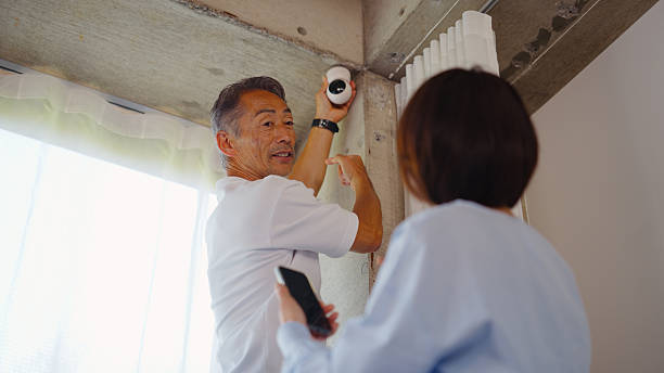 Professional CCTV camera installation securing a home and business property