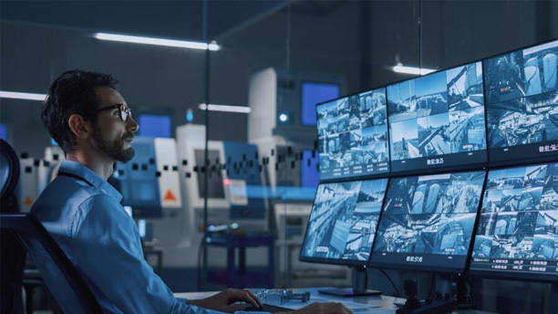 Remote CCTV monitoring system showing live video feeds on smartphone